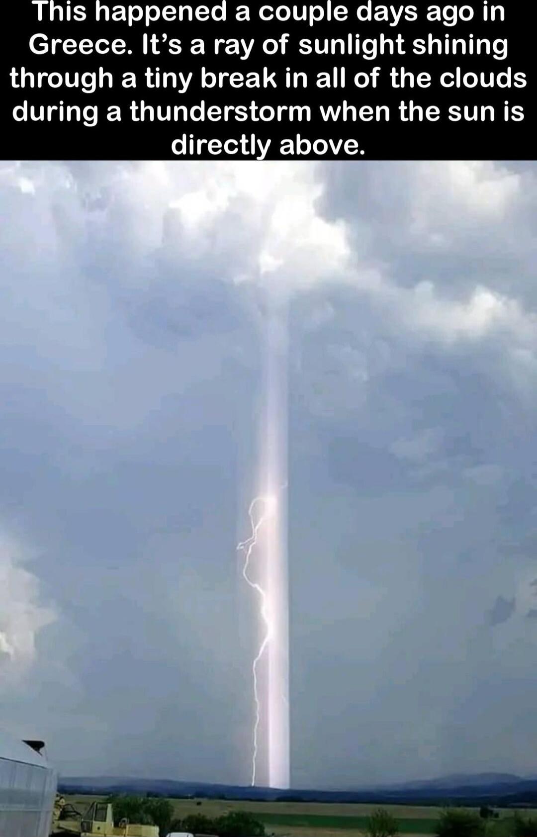 Is happened a couple days ago in Greece Its a ray of sunlight shining RGTGTIT IR G TCEL AT N R G during a thunderstorm when the sun is directly above