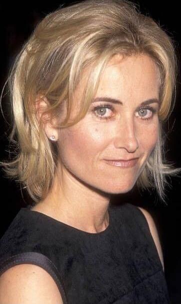 Portrait of a woman with short blonde hair.