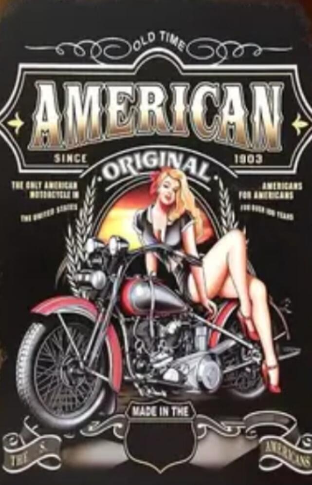 OLD TIME AMERICAN SINCE 1903 ORIGINAL MADE IN THE AMERICAS (center) A pin-up style illustration of a woman sitting on a motorcycle. Additional small text around includes phrases like 'The only American motorcycle' and 'For two wheels'.