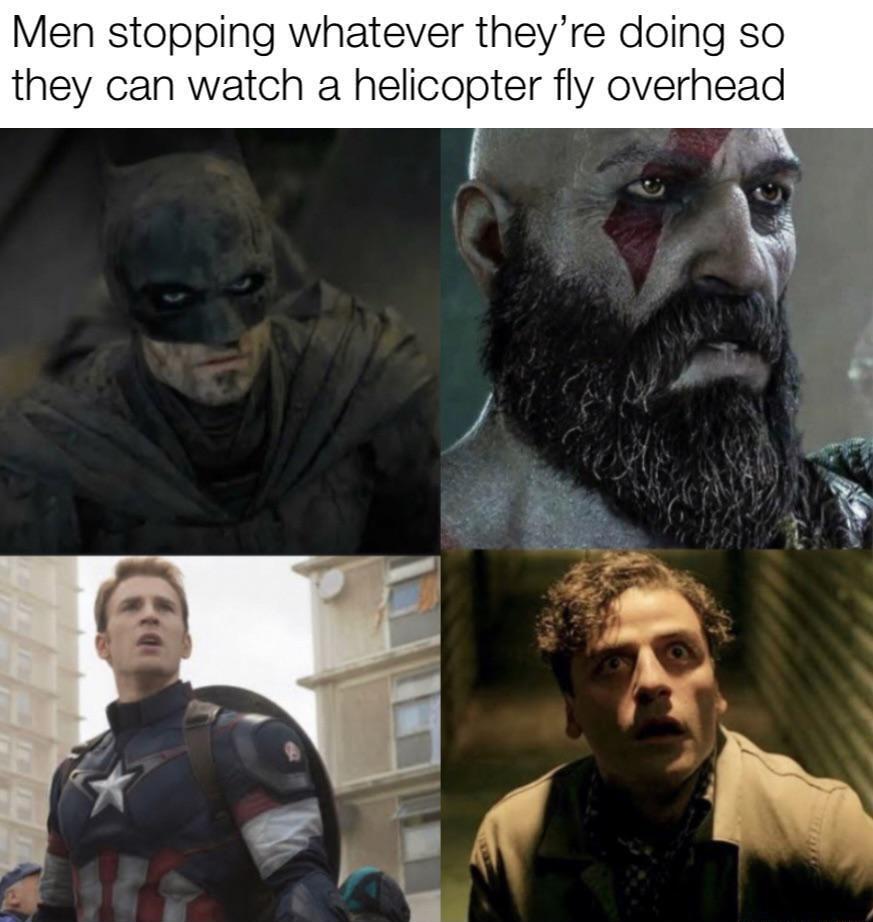 Men stopping whatever theyre doing so they can watch a helicopter fly overhead