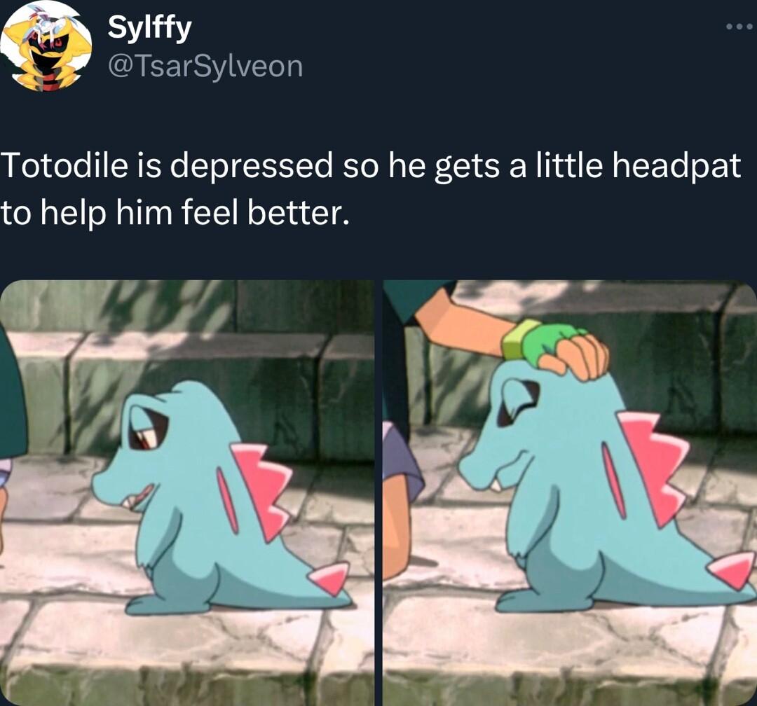 Sylffy TsarSylveon Totodile is depressed so he gets a little headpat to help him feel better