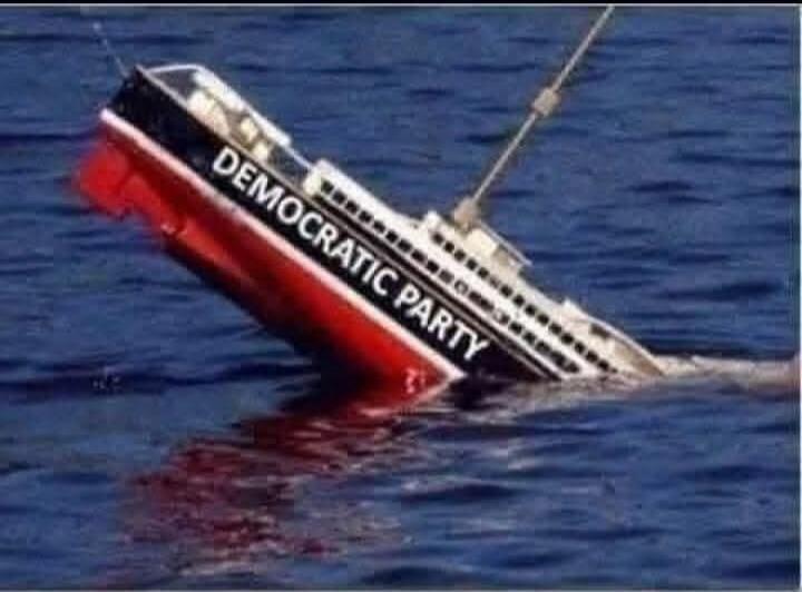 A ship labeled 'DEMOCRATIC PARTY' is sinking in the ocean, with its stern submerged and bow pointing upwards.