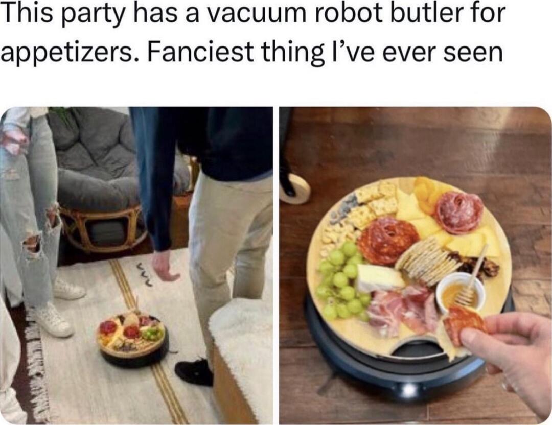 is party has a vacuum robot butler for appetizers Fanciest thing Ive ever seen
