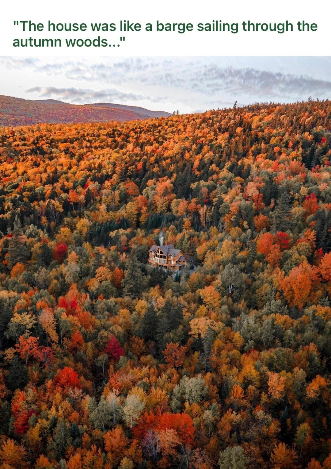 The house was like a barge sailing through the autumn woods