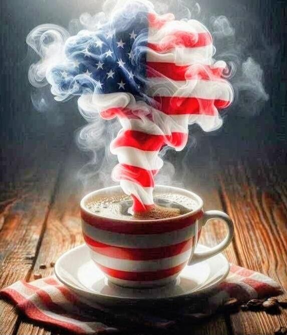 A cup of coffee with steam forming an American flag.
