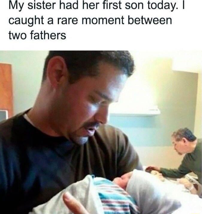 My sister had her first son today caught a rare moment between two fathers