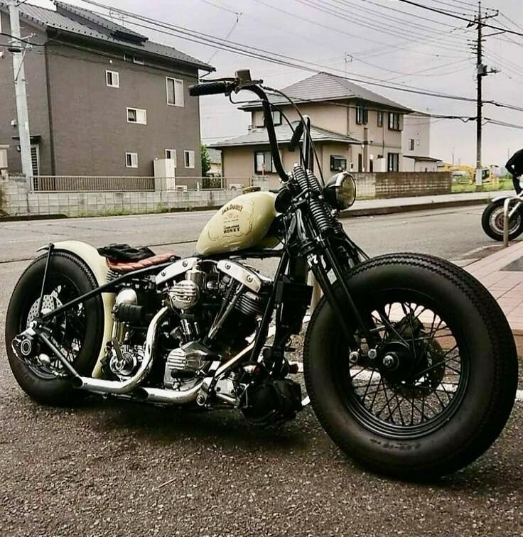Custom vintage-style motorcycle parked on a street