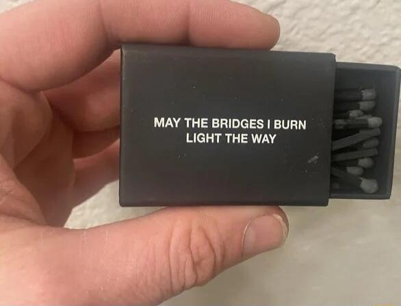 MAY THE BRIDGES BURN LIGHT THE WAY