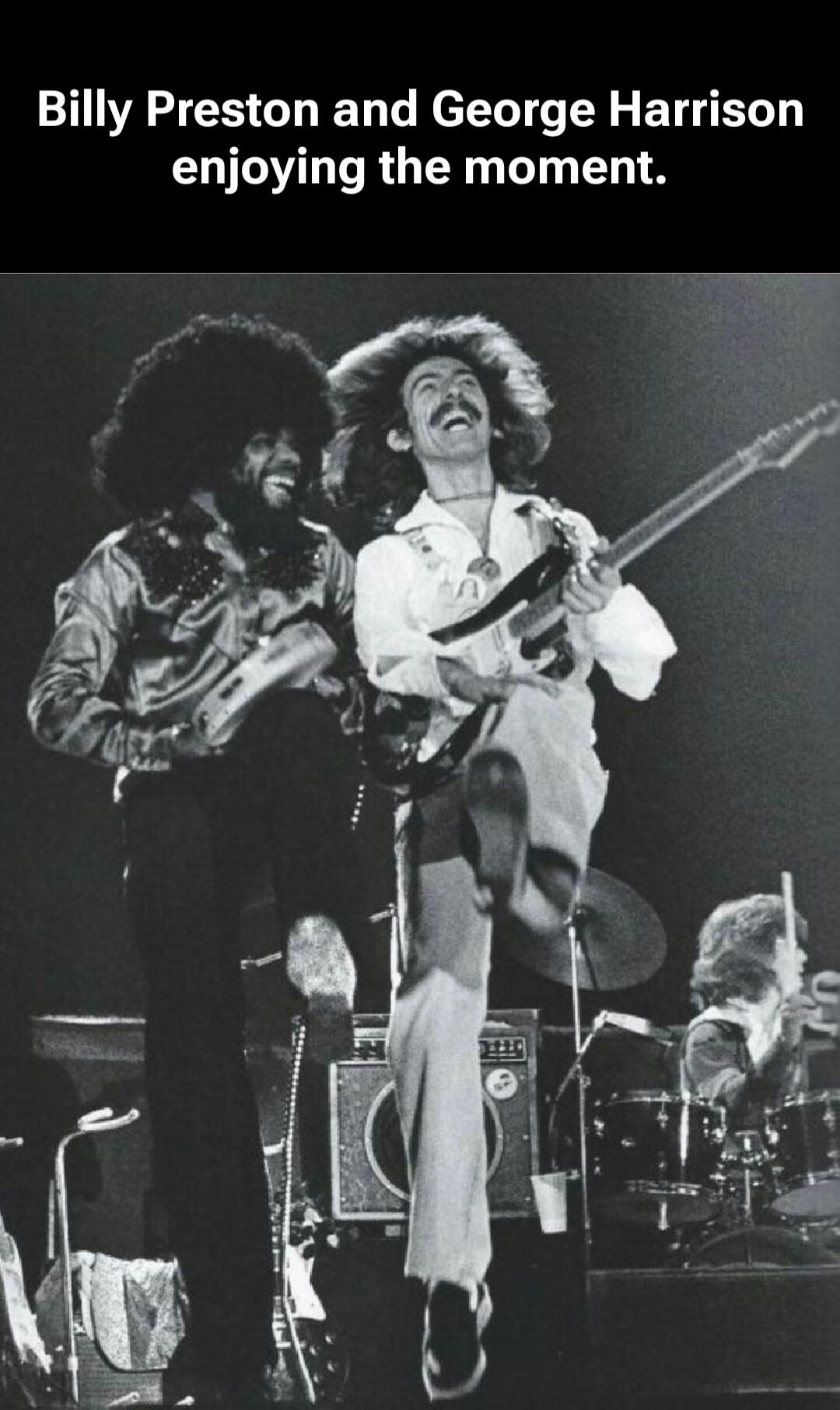 Billy Preston and George Harrison enjoying the moment.