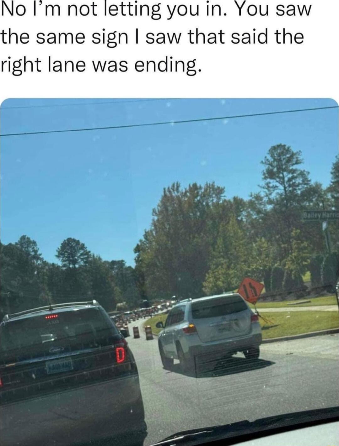 No Im not letting you in he same sign saw that said the right lane was ending