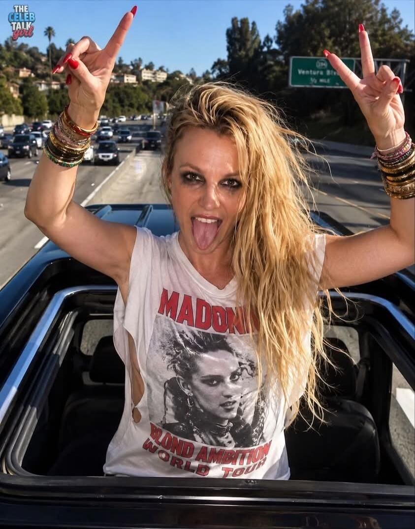 THE CELEB TALK GIRL MADONNA BLOND AMBITION WORLD TOUR VENTURA BLVD 3/4 MILE. A woman with blonde hair, possibly Britney Spears, is sticking her tongue out and making peace signs while standing out of a car's sunroof on a highway.