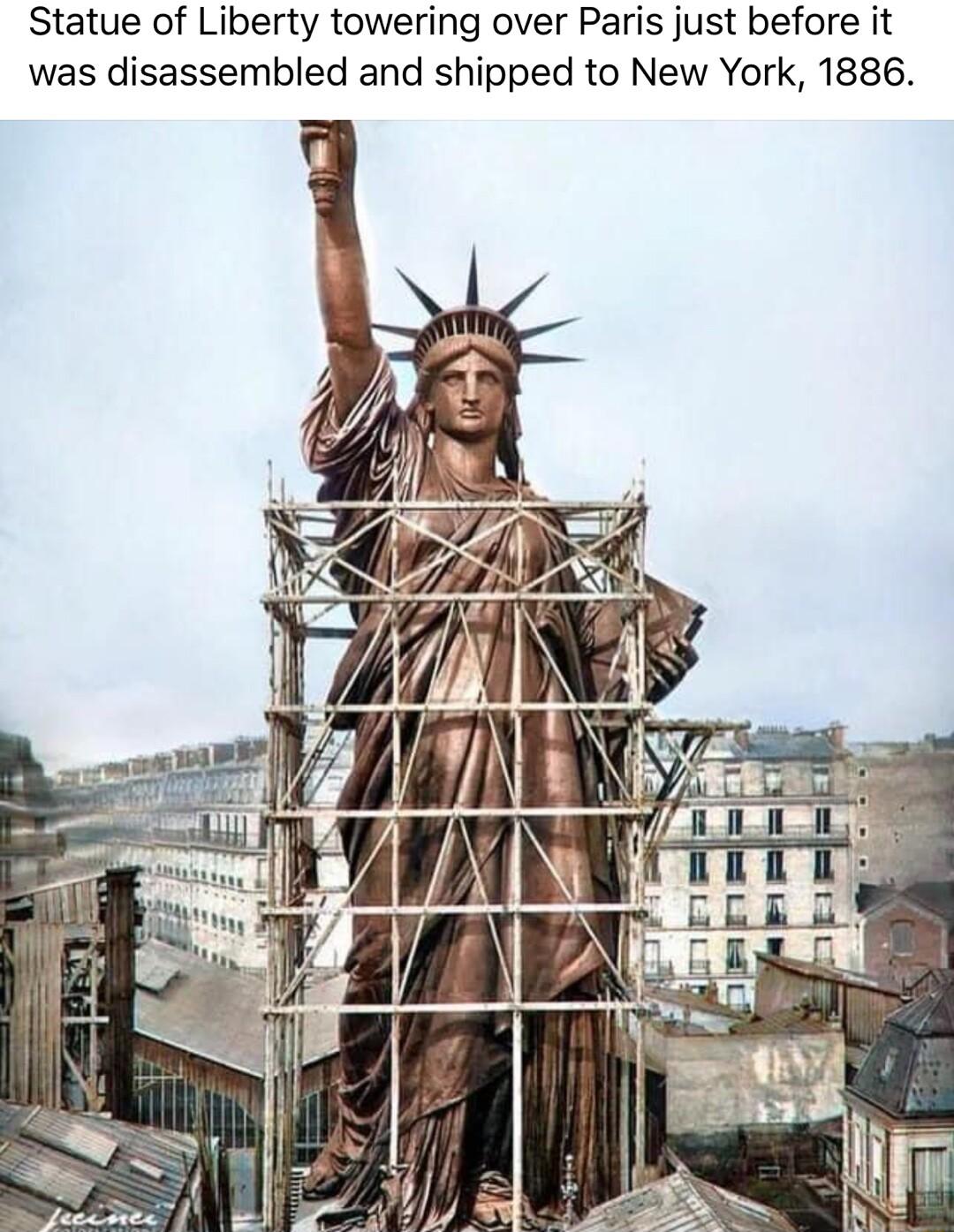 Statue of Liberty towering over Paris just before it was disassembled and shipped to New York 1886