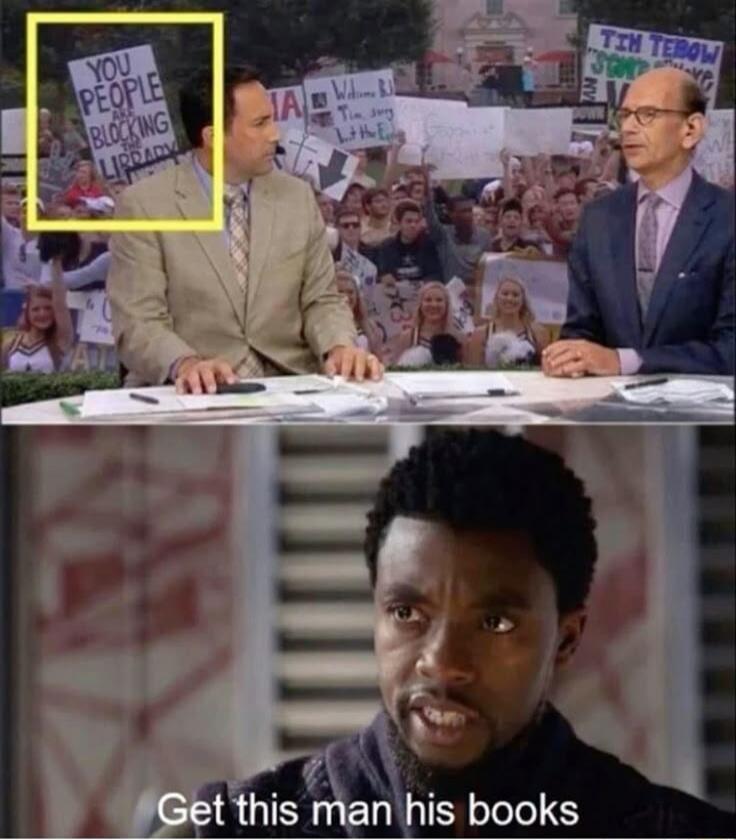 YOU PEOPLE ARE BLOCKING THE LIBRARY. Get this man his books.