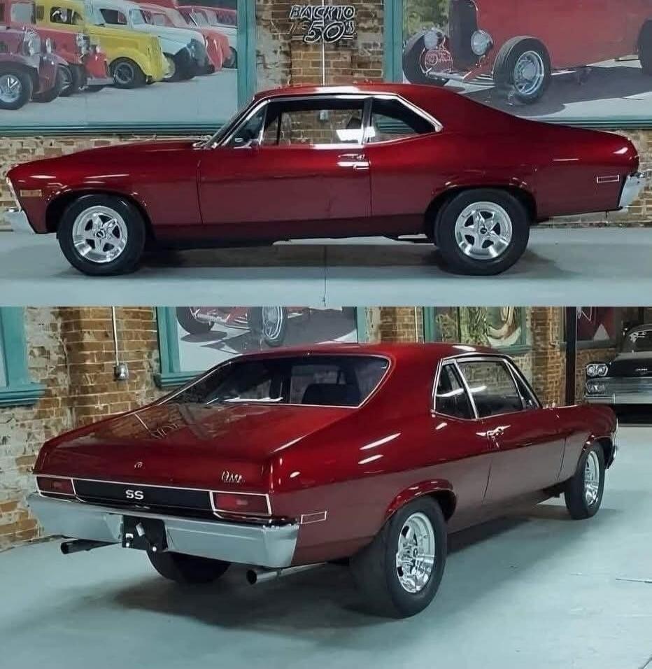 Red classic muscle car with SS badge (rear view).