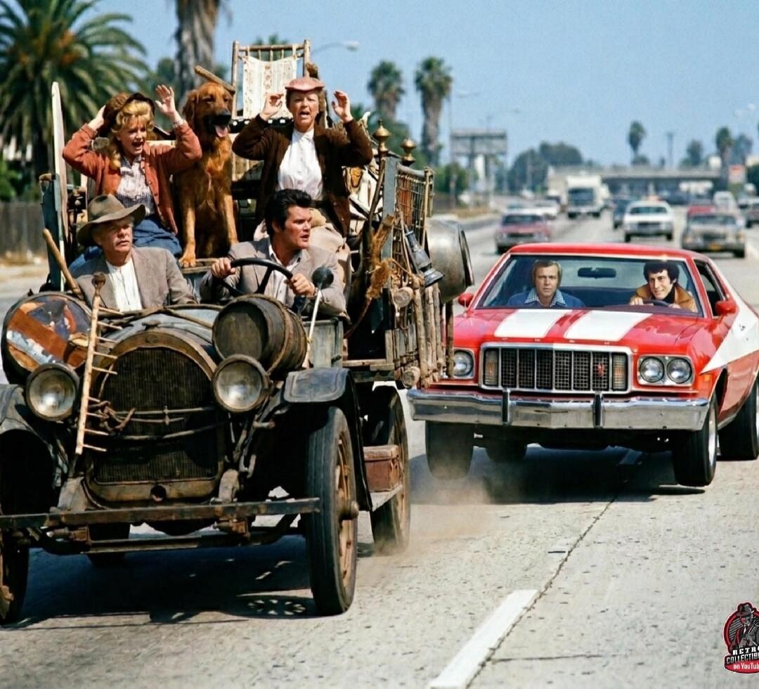 A vintage car with several people and a dog looking surprised, driving alongside a red and white Ford Gran Torino with two men inside. The scene depicts a humorous or action-packed encounter on a road. Text on image: RETRO COLLECTIBLES on YouTube.