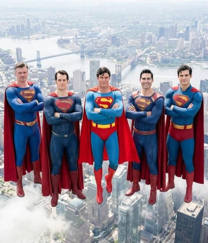 Five people dressed as Superman standing in a row over a city skyline.