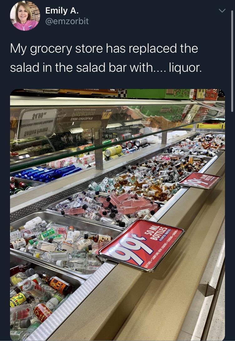 Emily A v emzorbit V Ve olelIgVAS o N aE N To EletTo Rt g o salad in the salad bar with liquor