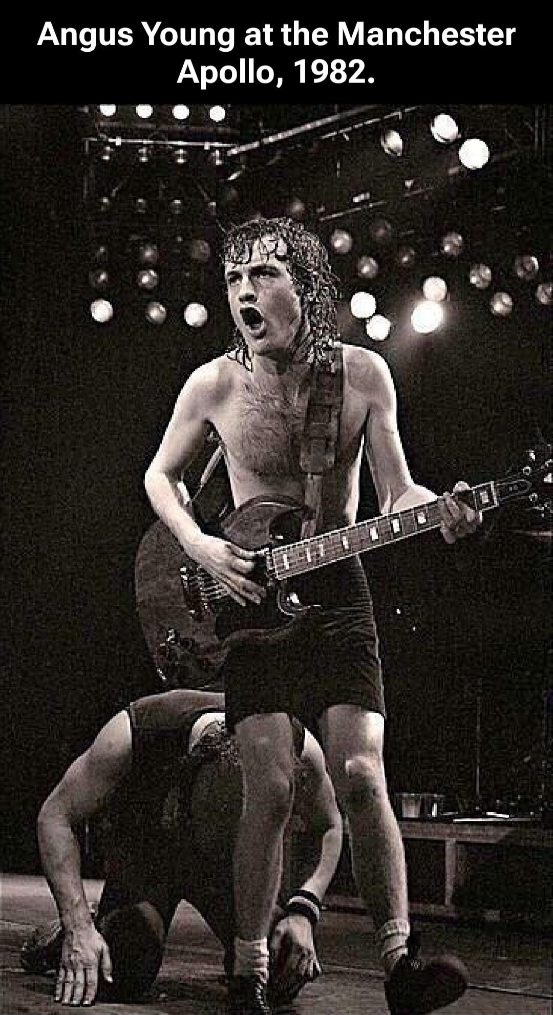 Angus Young at the Manchester Apollo, 1982.