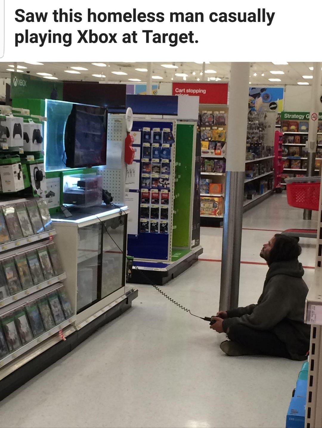 Saw this homeless man casually playing Xbox at Target