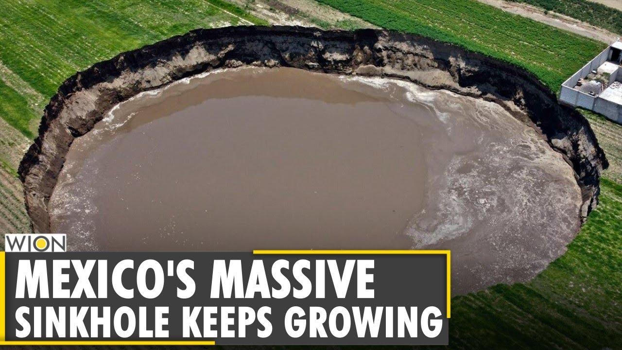 o y Ry T YN SINKHOLE KEEPS GROWING