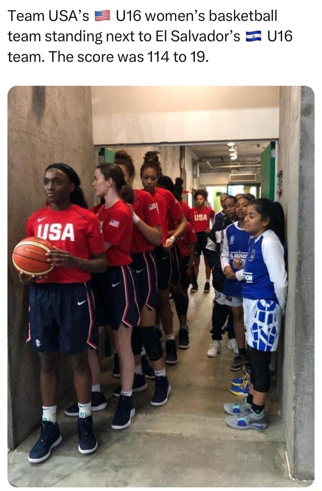 Team USAs 16 womens basketball team standing next to El Salvadors U16 team The score was 114 to 19