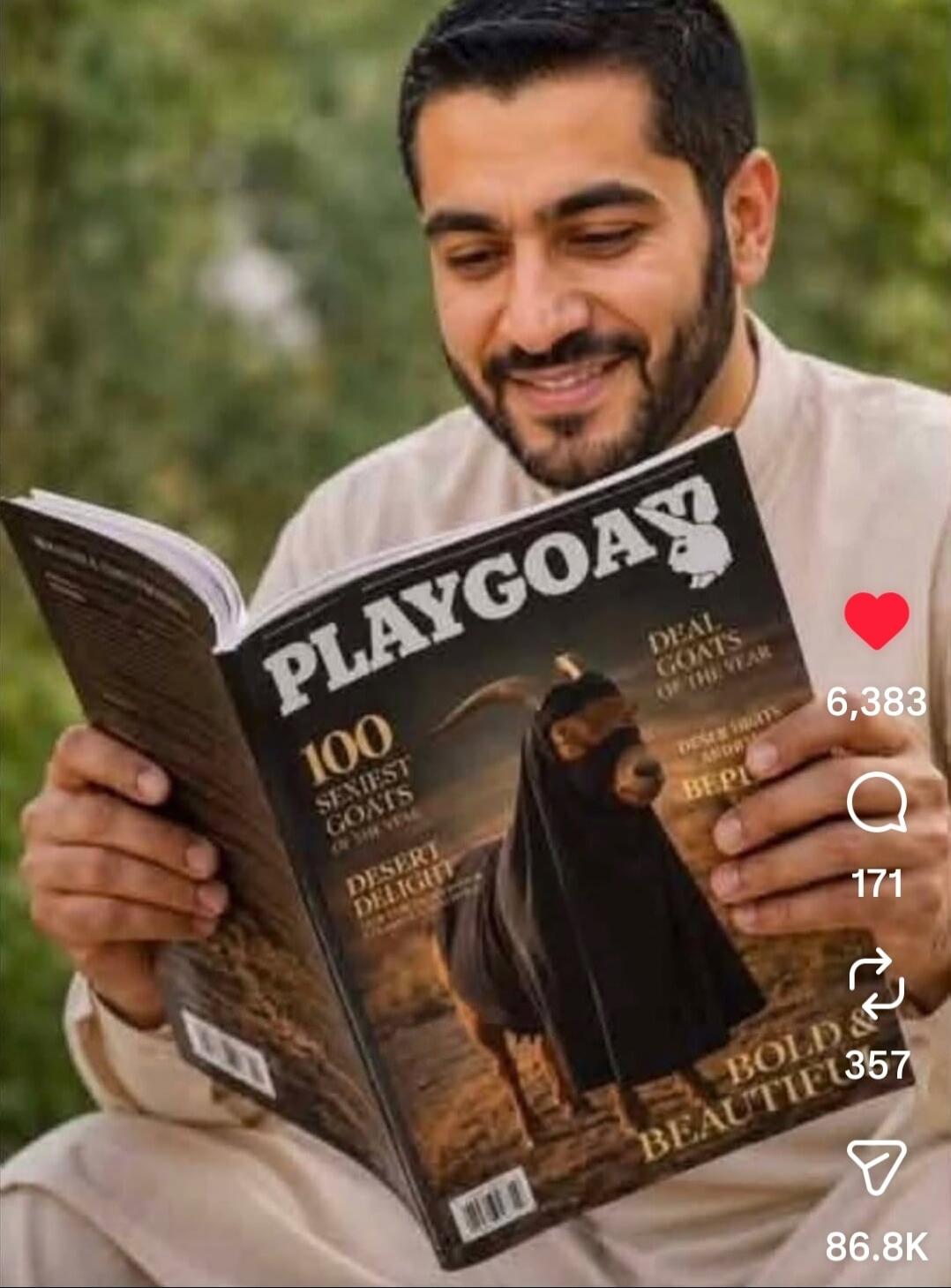 A man is smiling while reading a magazine titled 