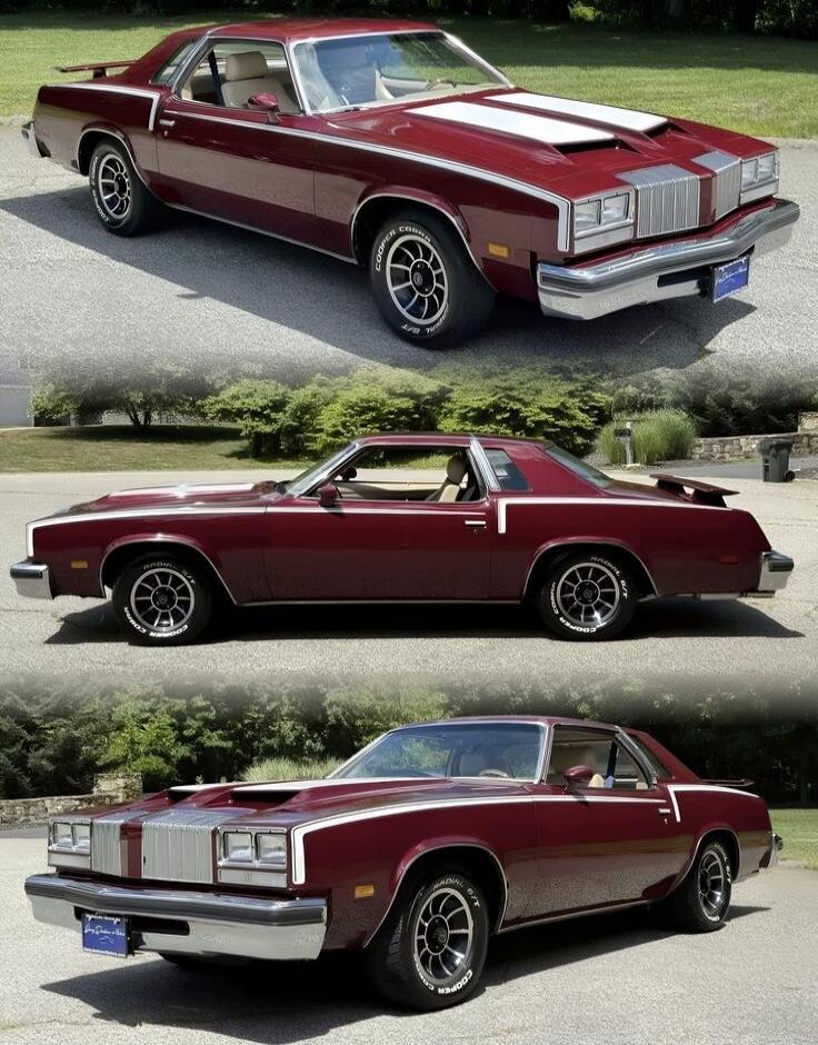 A classic maroon car with white racing stripes. The license plate reads 'LONG ISLAND NEW YORK'. The tires are 'COOPER COBRA RADIAL G/T'.