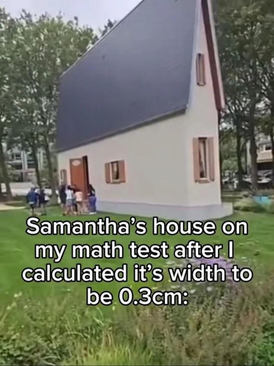 Samantha's house on my math test after I calculated it’s width to be 0.3cm: