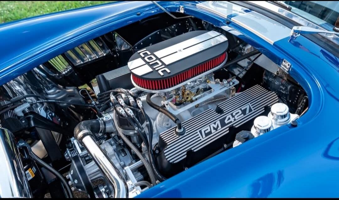 PM 427 on the valve cover; conic on the round air filter