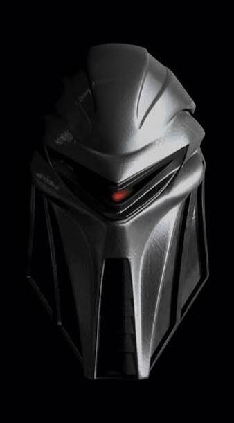 The image shows a close-up of a futuristic, metallic helmet with a red glowing eye.