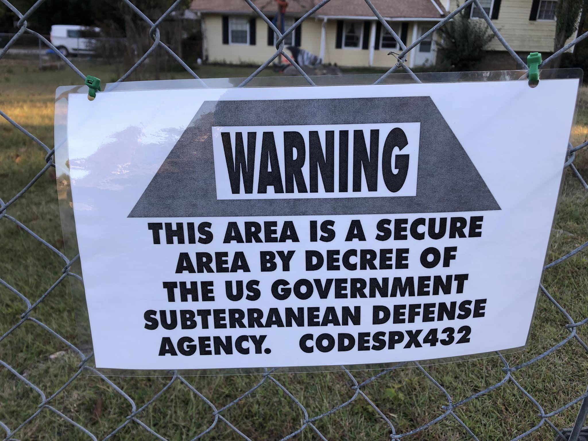THIS AREA IS A SECURE AREA BY DECREE OF THE US GOVERNMENT SUBTERRANEAN DEFENSE AGENCY CODESPX432