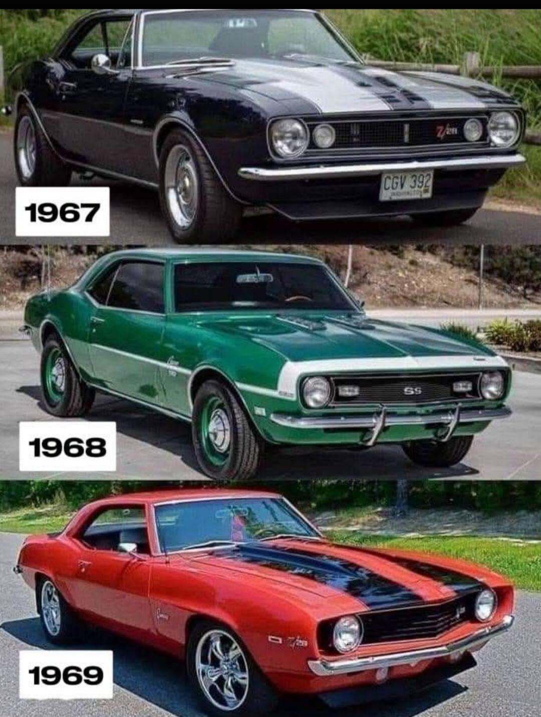 Three classic Chevrolet Camaro cars from 1967, 1968, and 1969 are shown, highlighting their design evolution. The 1967 model is dark blue with silver stripes and a Z/28 badge. The 1968 model is green with white stripes and an SS badge. The 1969 model is red with black stripes.