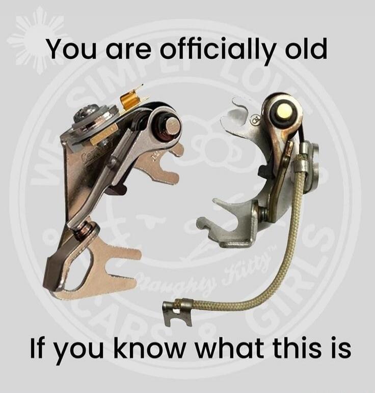 You are officially old If you know what this is. The image shows two sets of automotive ignition points, also known as breaker points, which were used in older car distributors.