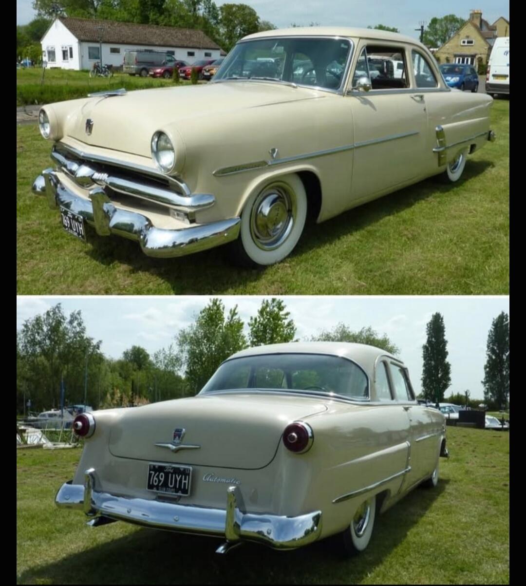A classic cream-colored car, possibly a Ford, with a license plate reading '769 UYH' and 'Automatic' badging on the rear. The car features chrome bumpers and whitewall tires.