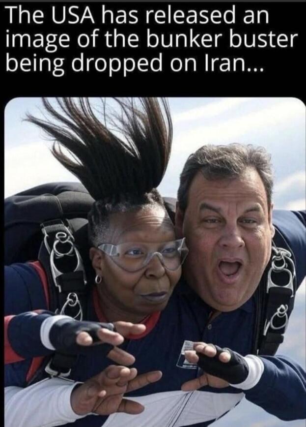 The USA has released an image of the bunker buster being dropped on Iran... A meme featuring Whoopi Goldberg and Chris Christie skydiving, with Whoopi looking calm and Chris looking surprised. The text above sarcastically implies they are a 'bunker buster' dropped on Iran.