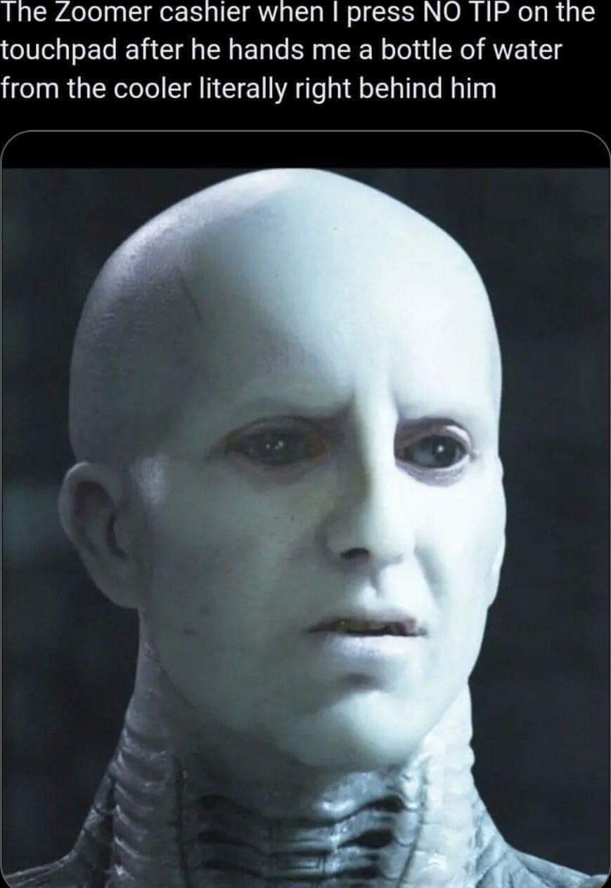 The Zoomer cashier when press NO T1P on the touchpad after he hands me a bottle of water from the cooler literally right behind him