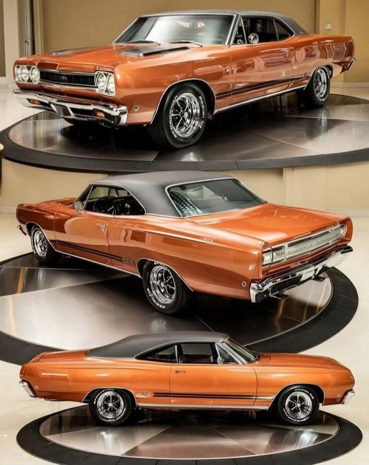 Three classic Dodge Coronet R/T cars in orange.