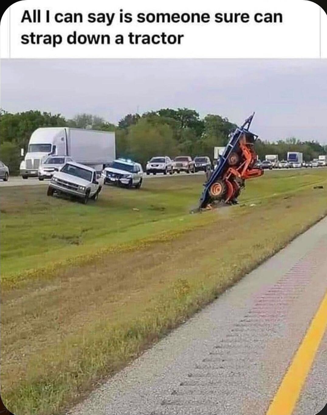 All can say is someone sure can strap down a tractor