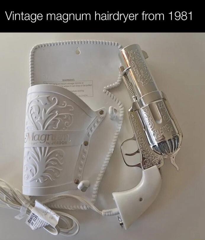 Vintage magnum hairdryer from 1981. Magnum by Jeadon. WARNING. DANGER OF ELECTRIC SHOCK.