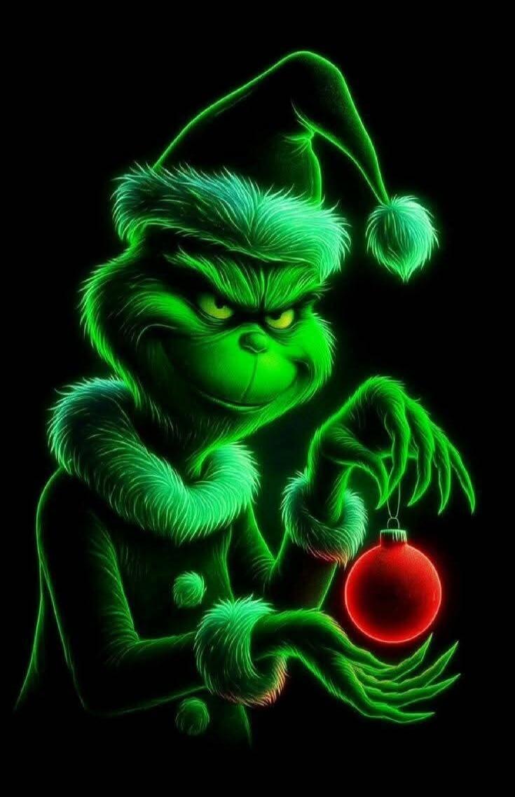 The Grinch in a neon green glow, wearing a Santa hat and fur-trimmed outfit, is holding a red Christmas ornament.