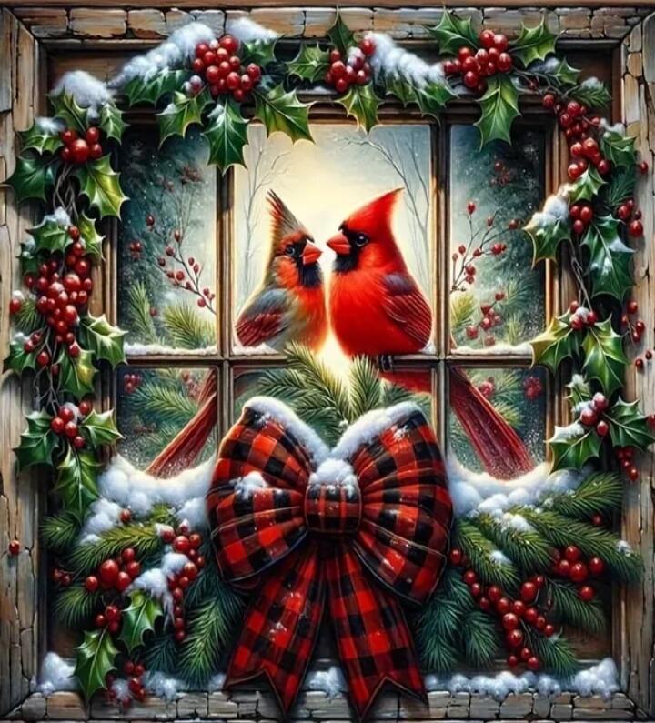 Two cardinals perched at a snowy window, framed by festive holly and a large red plaid bow.