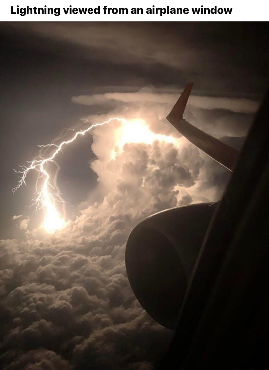 ightning viewed from an airplane window