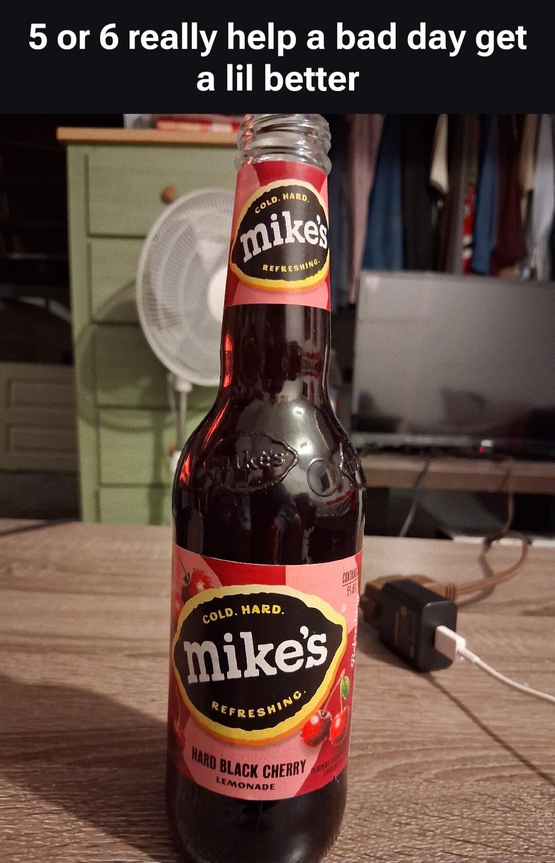 5 or 6 really help a bad day get a lil better

[image shows a Mike's Hard Black Cherry Lemonade bottle]