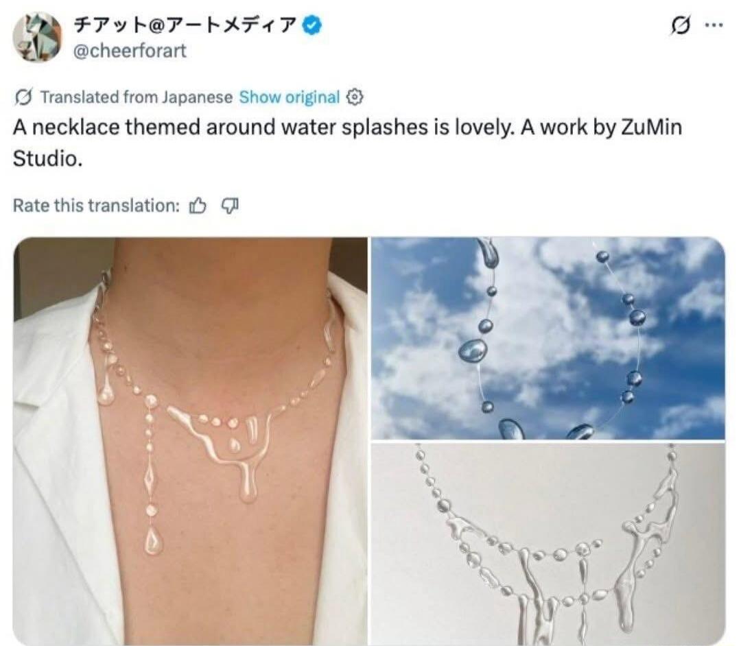 A necklace themed around water splashes is lovely. A work by ZuMin Studio.