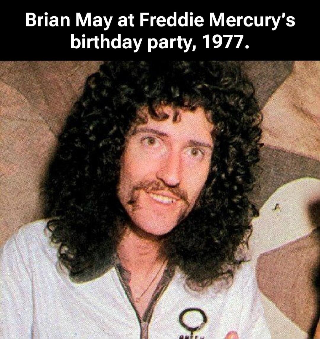Brian May at Freddie Mercury's birthday party, 1977.