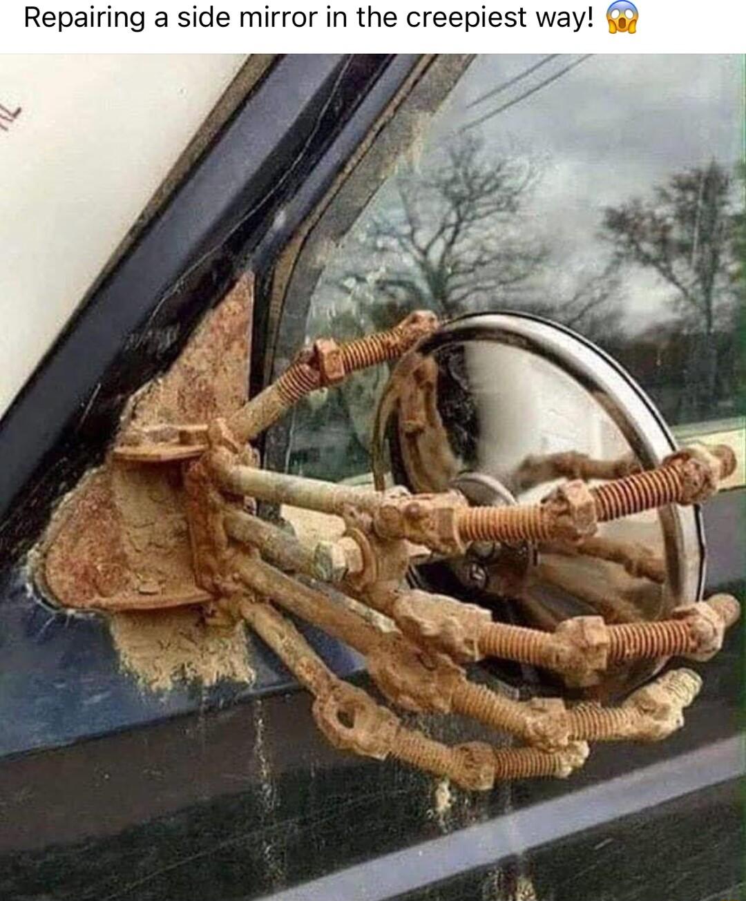 Repairing a side mirror in the creepiest way
