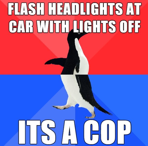 FLASHIHEADLIGHTS AT CAR WITHLIGHTS OFF ITS A COP