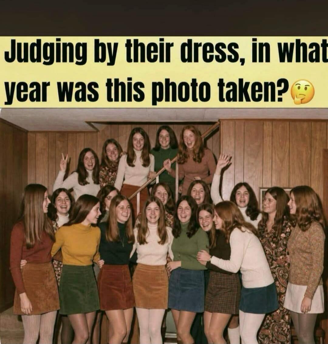 Judging by their dress, in what year was this photo taken?
