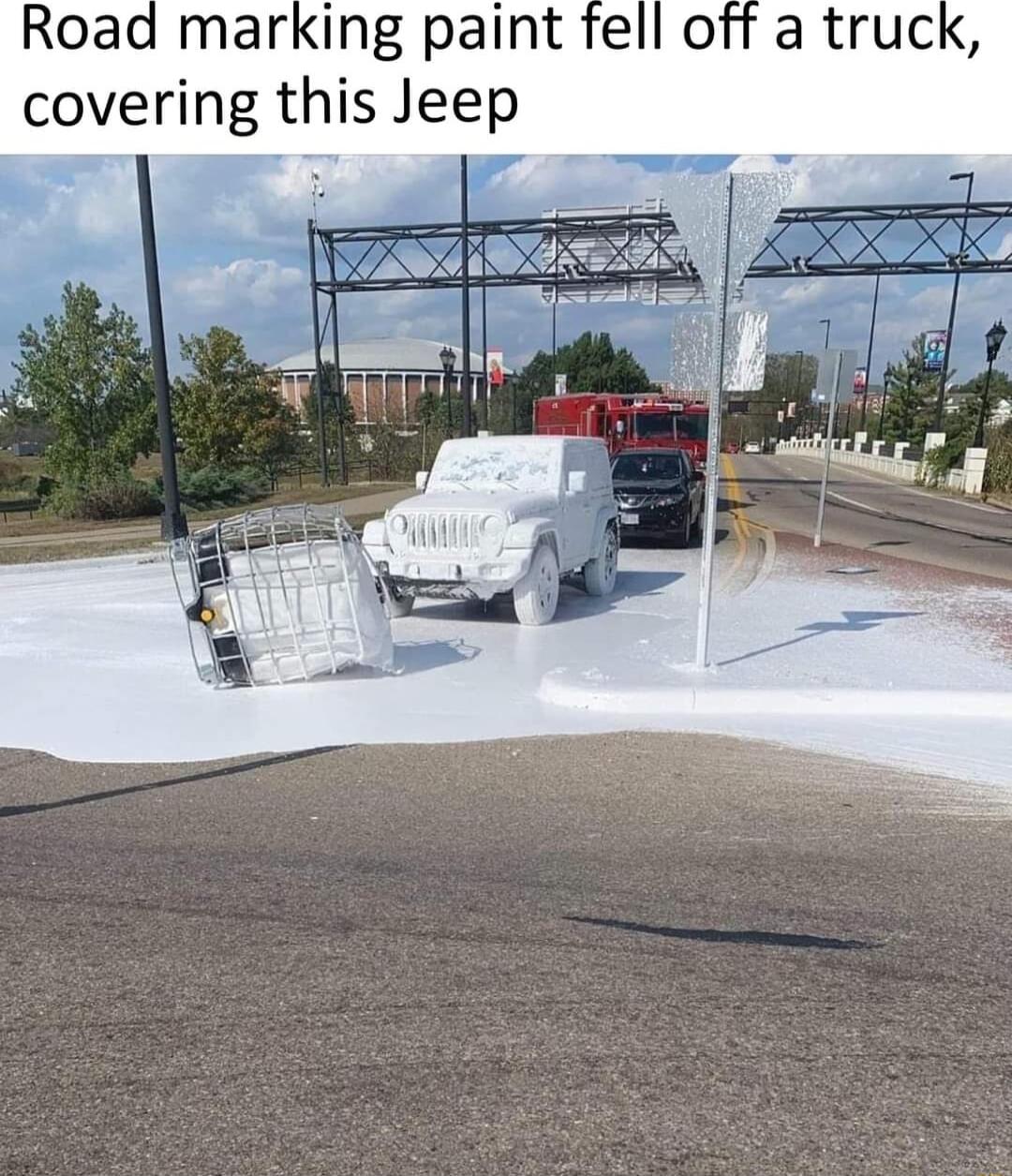 Road marking paint fell o covering this Jeep