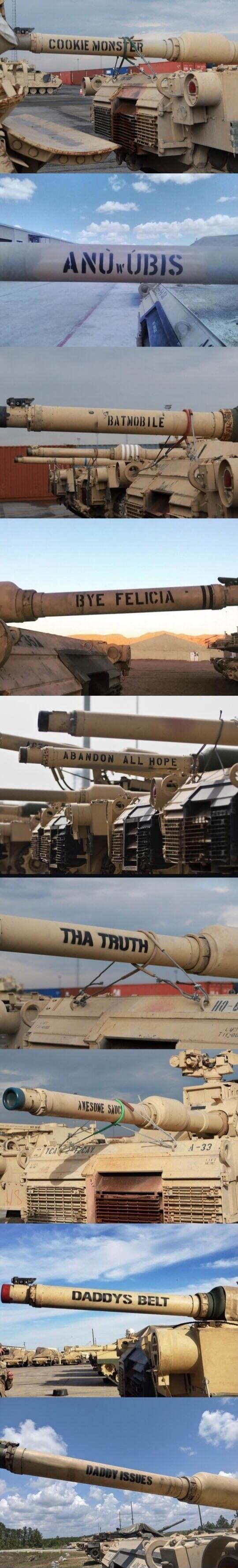 COOKIE MONSTER, ANU'UBIS, BATMOBILE, BYE FELICIA, ABANDON ALL HOPE, THA TRUTH, AWESOME SAUCE, DADDY'S BELT, DADDY ISSUES. These are various humorous and pop-culture-inspired names written on the barrels of military tanks.